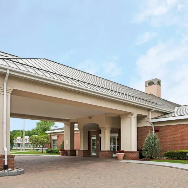Covered entrance of Homewood Suites by Hilton Albany