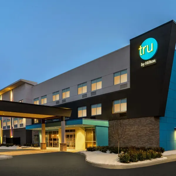 Tru by Hilton Albany Airport exterior and entrance at dusk